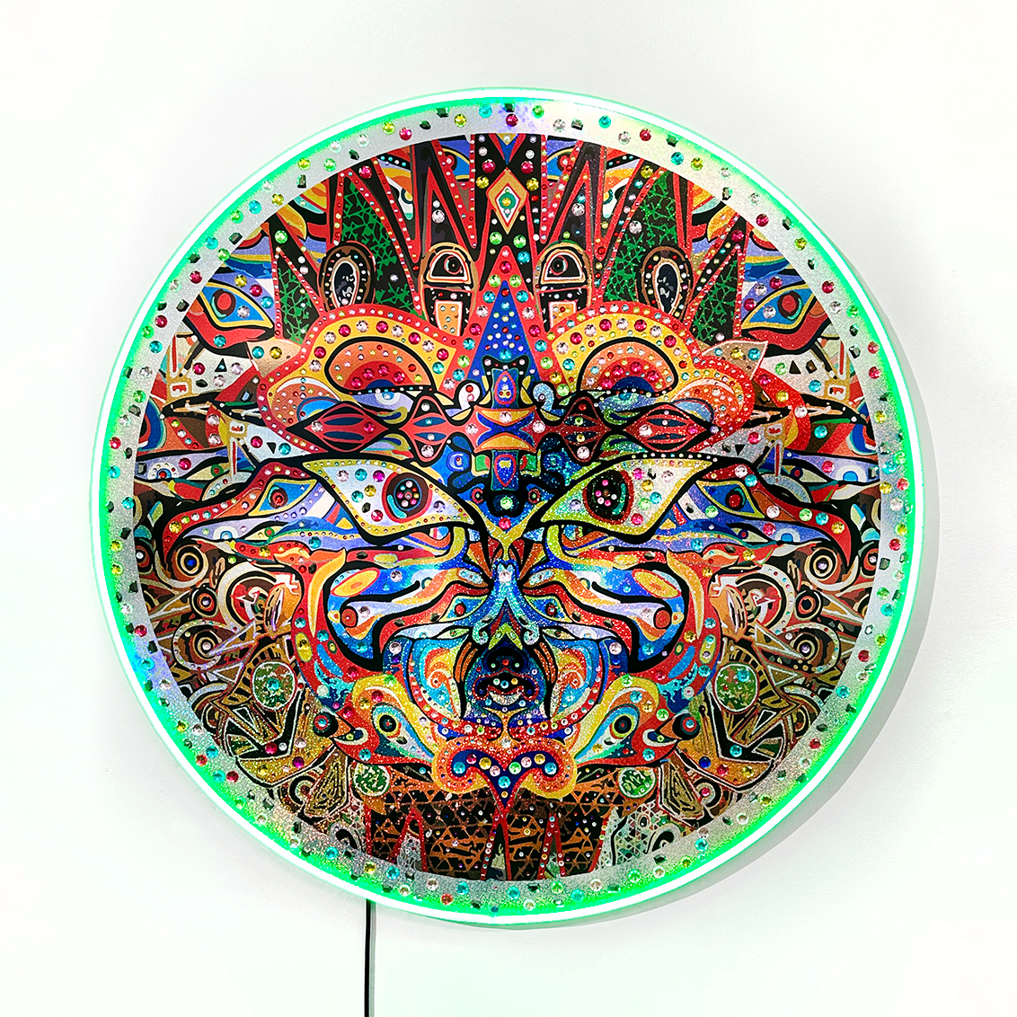 RICHARD BOYD-DUNLOP Chameleon - Disk holographic collage on board, rhinestones, and LED lighting green and red face design